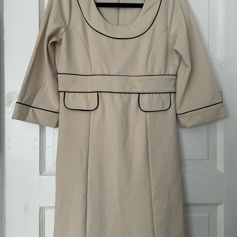 Elegant Cream Dress with Black Trim